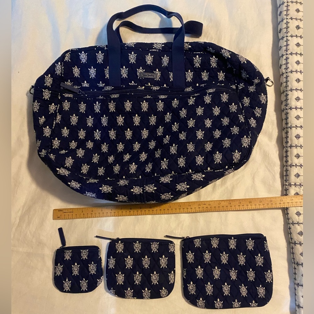 Vera Bradley. Used once. Set of 4 bags.